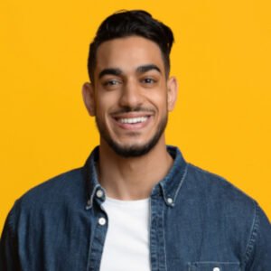 Smiling Middle Eastern Man In Casual With Laptop Y9EY47V 300x300